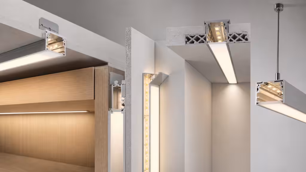 Surface-mounted, recessed, corner, plaster-in, and suspended LED aluminium profiles in a modern interior