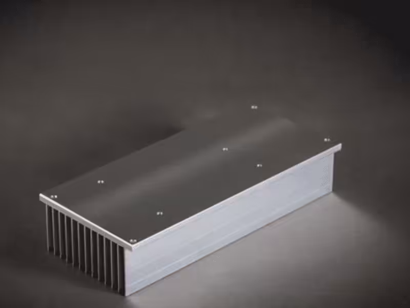 Large rectangular aluminum extruded heat sink with a flat top surface.