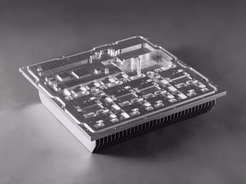 precision-machined aluminum base station housing with a built-in heat sink.