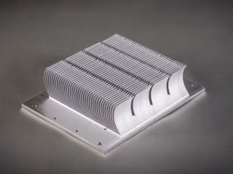 An assortment of silver and black aluminum extruded heat sinks in various sizes=